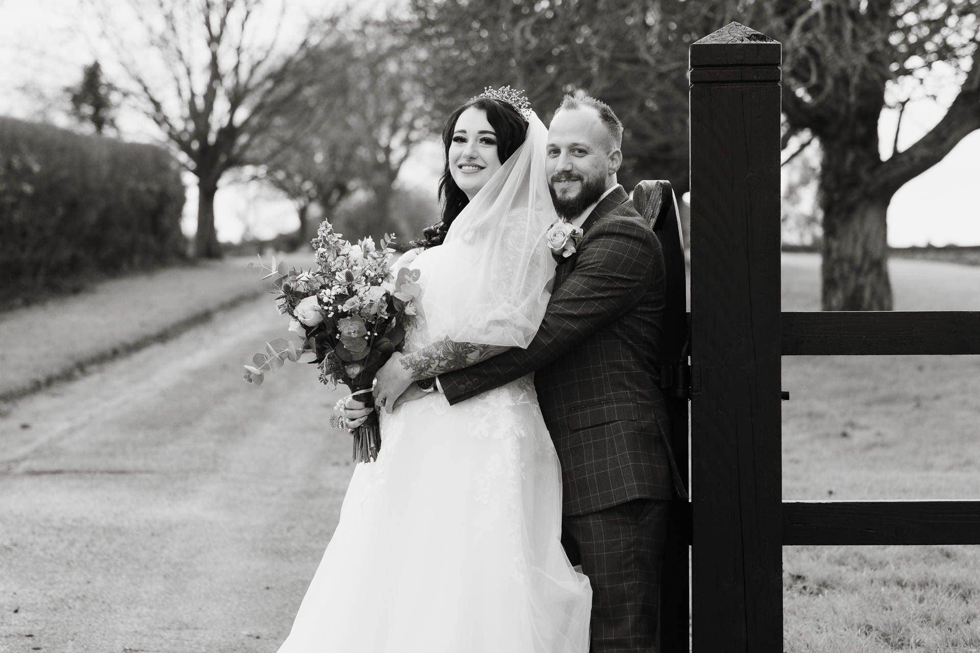 Couple kissing with a beautiful sunset at All Manor of Events Heffs Photography