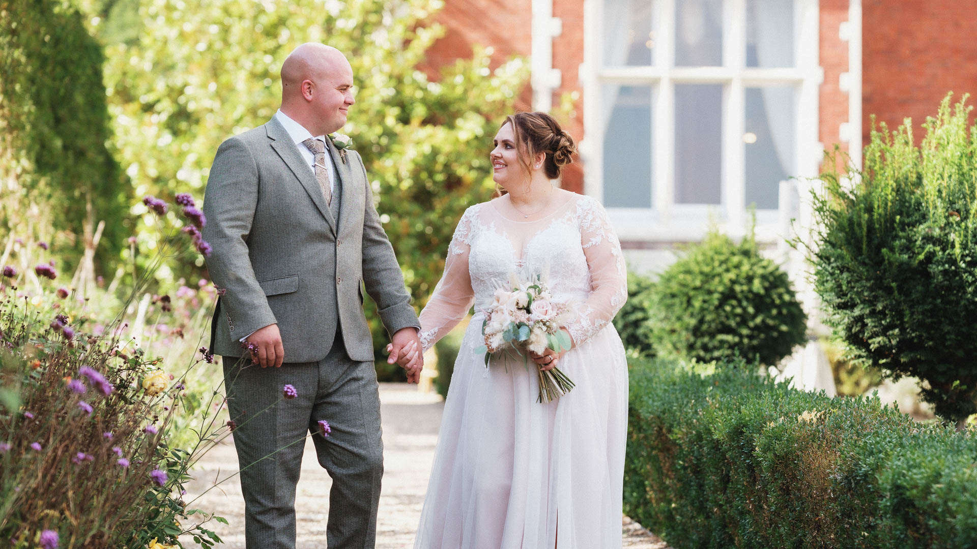 Nicole and Wills wedding at Wivenhoe house, walking through the golden hour, Heffs Photography
