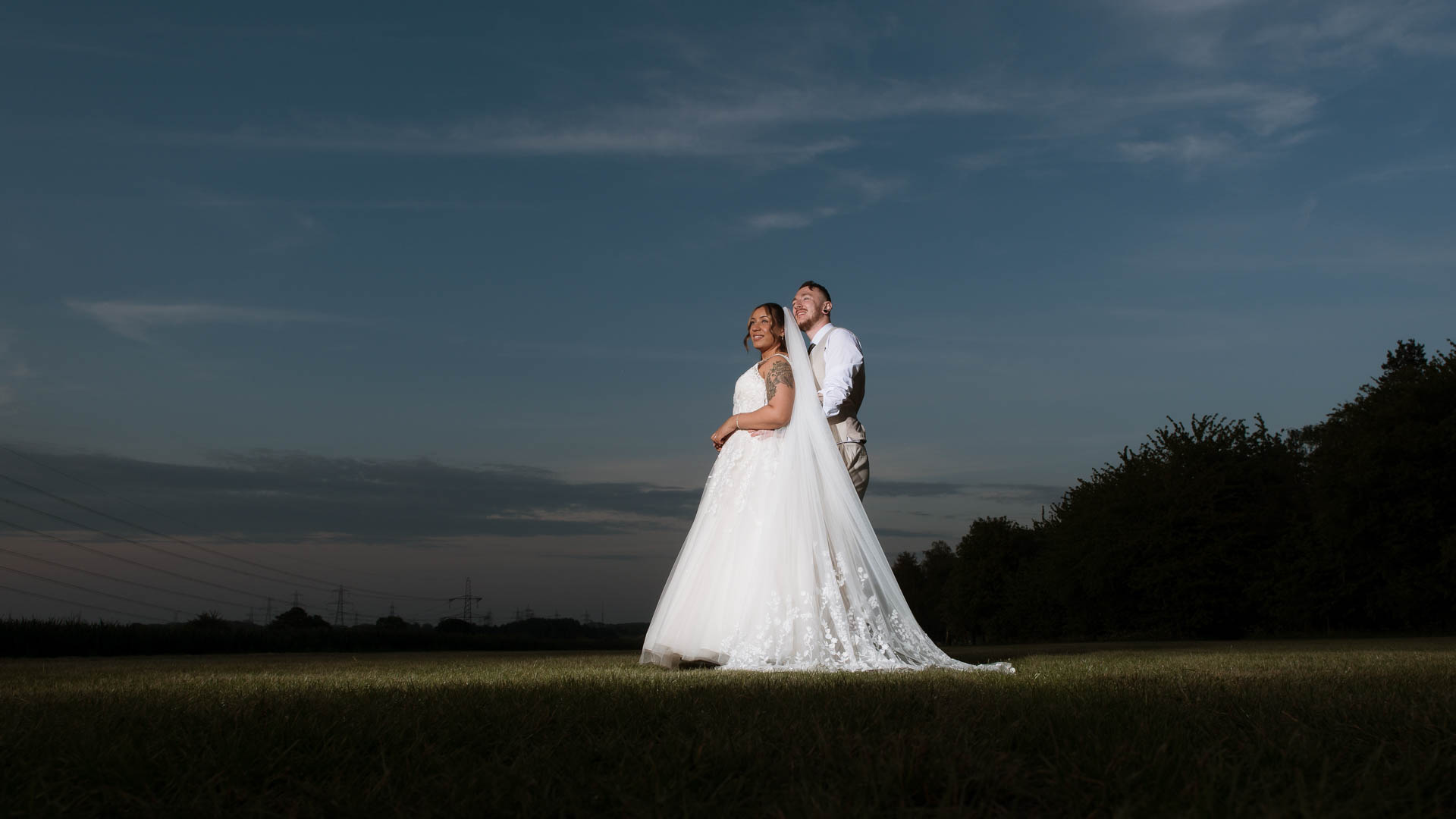 Bride and Groom in a field, Hintlesham Golf Club, Heffs Photography, Suffolk Wedding Photographer,  