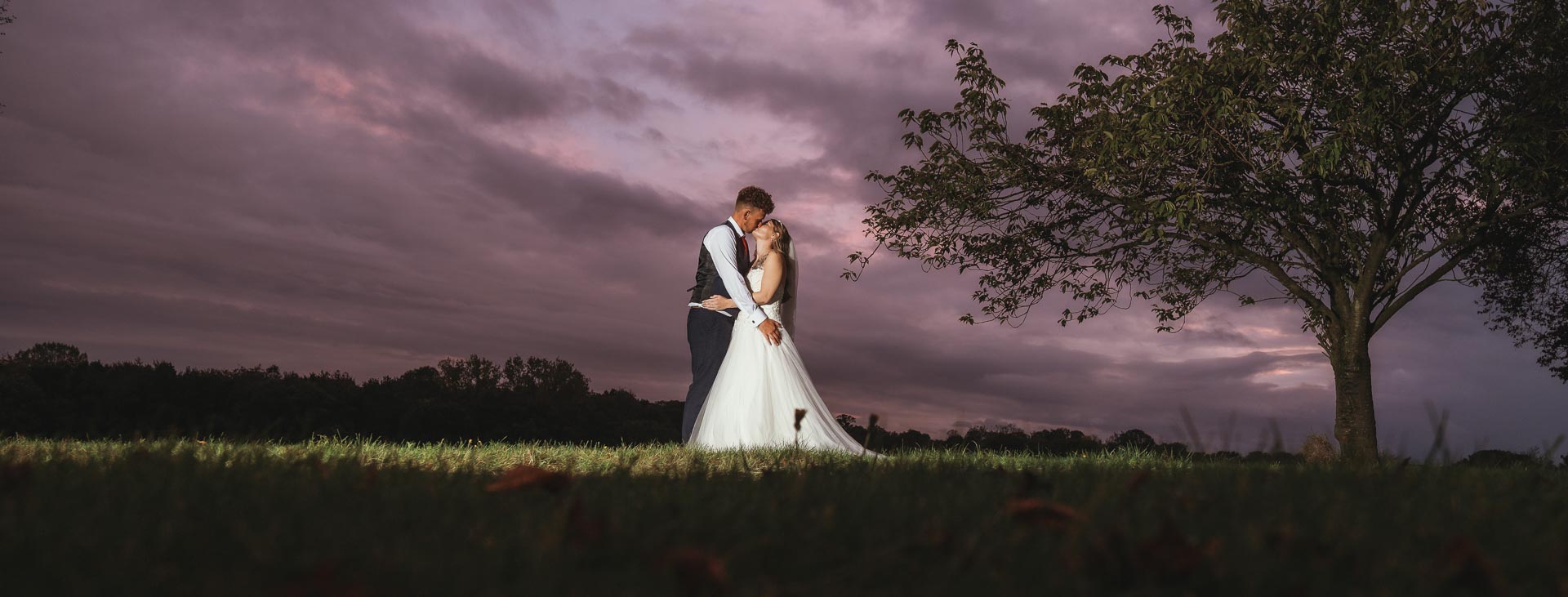 Wedding couple kissing in a field, All Manor of Events, Henley, Heffs Photography, 