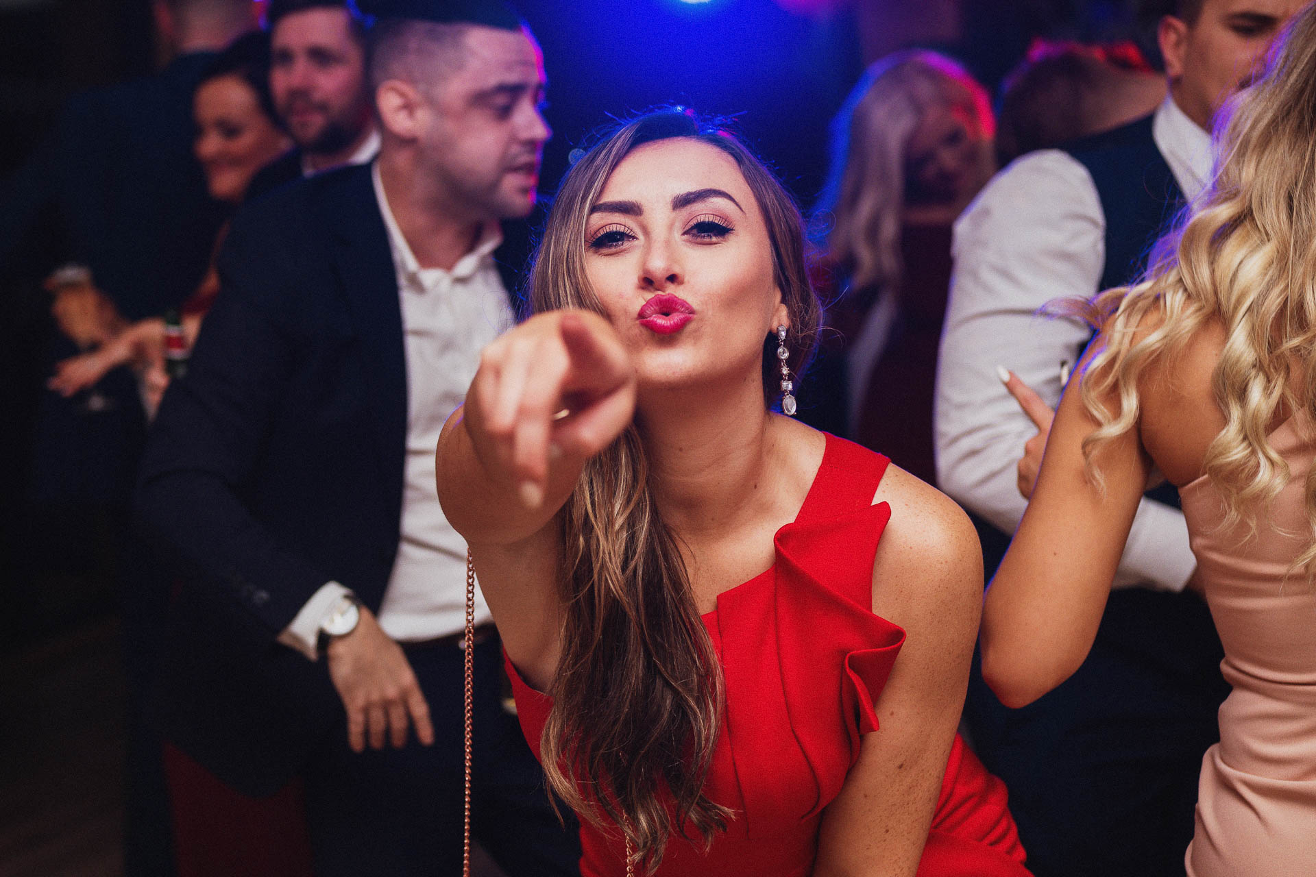 woman pointing at camera on the dancefloor, Heffs Photography, Ipswich Wedding Photographer,