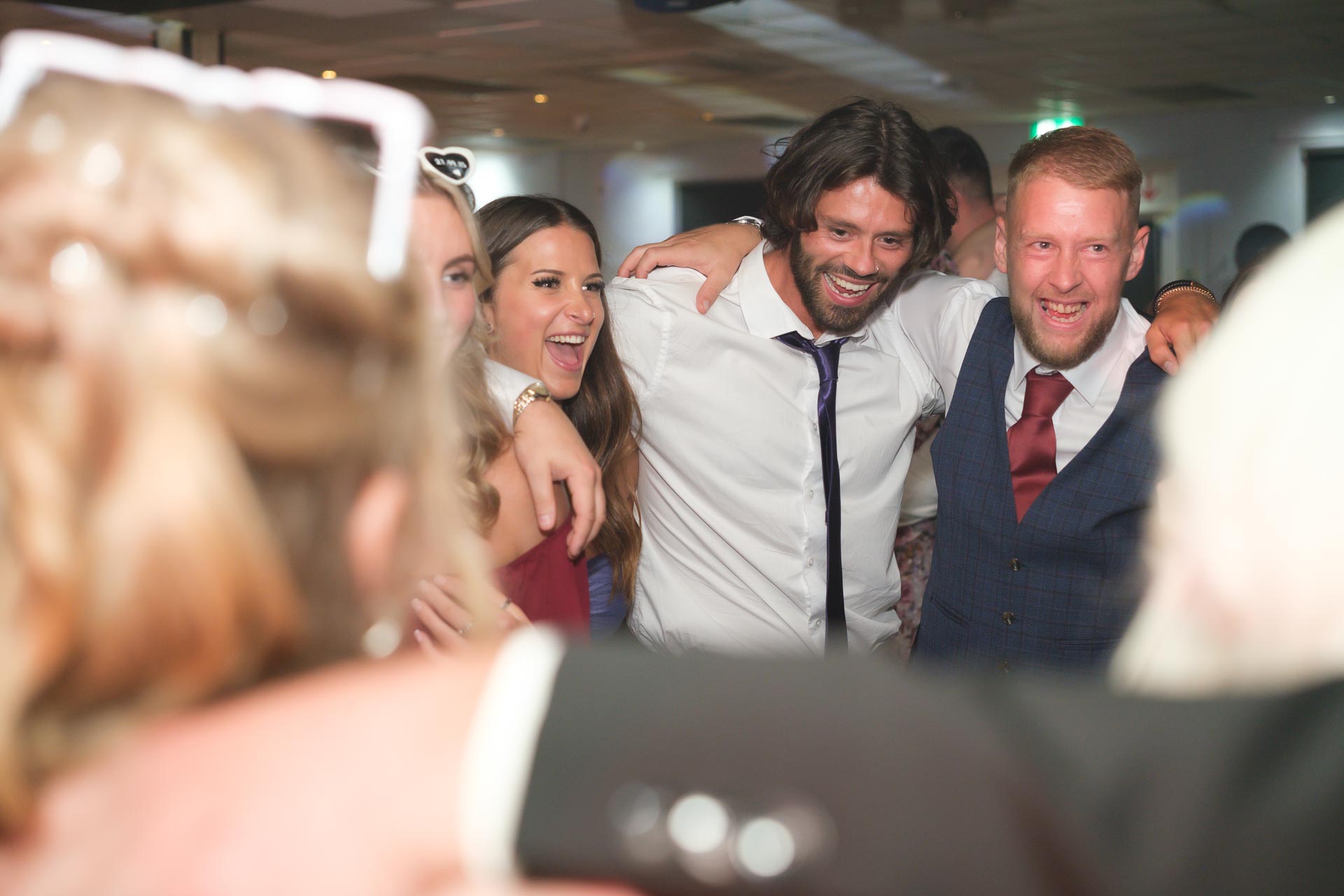 group hugs on the dancefloor, Heffs Photography, 