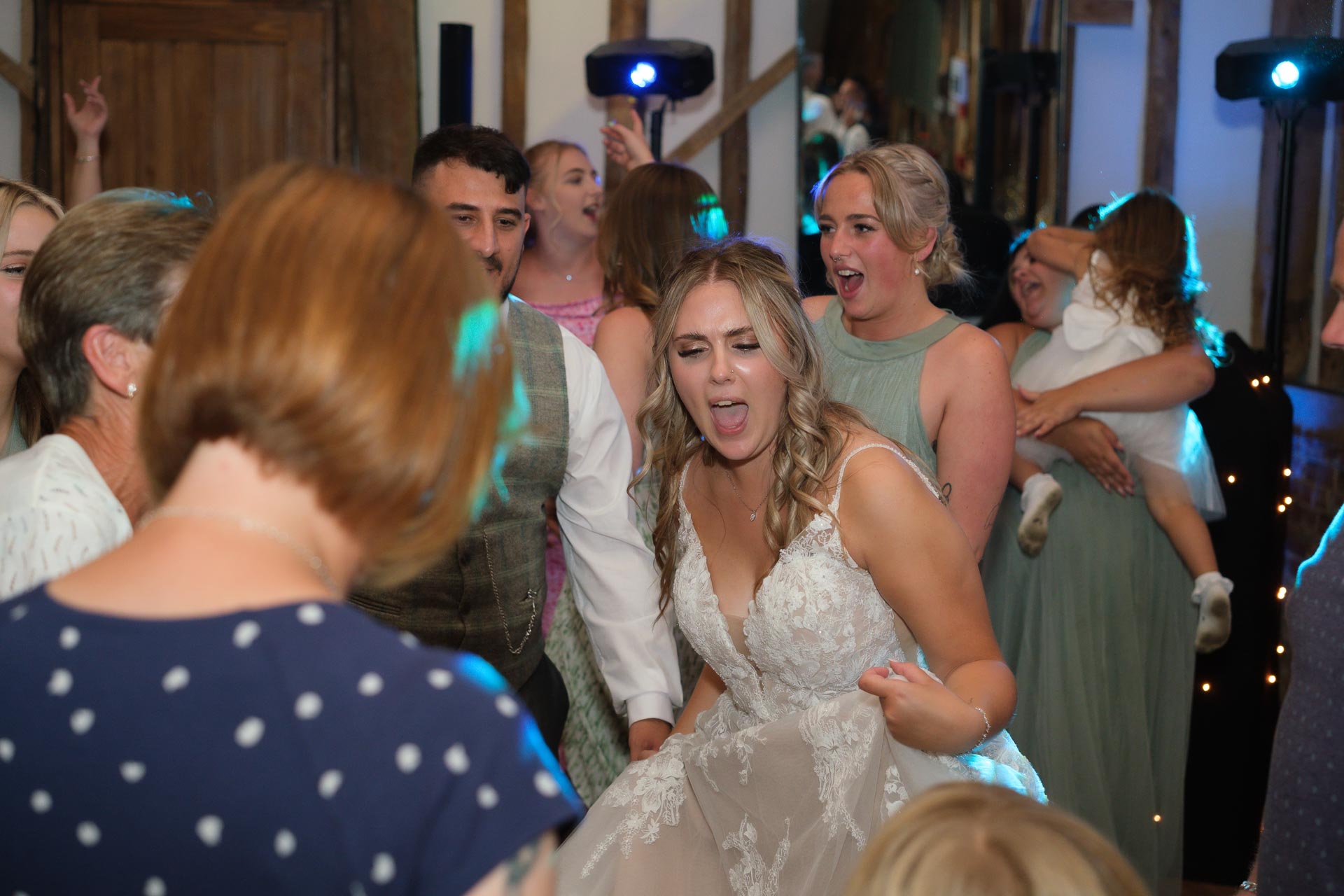 Wedding bride enjoying the dancing in the evening, Suffolk Weddings, 