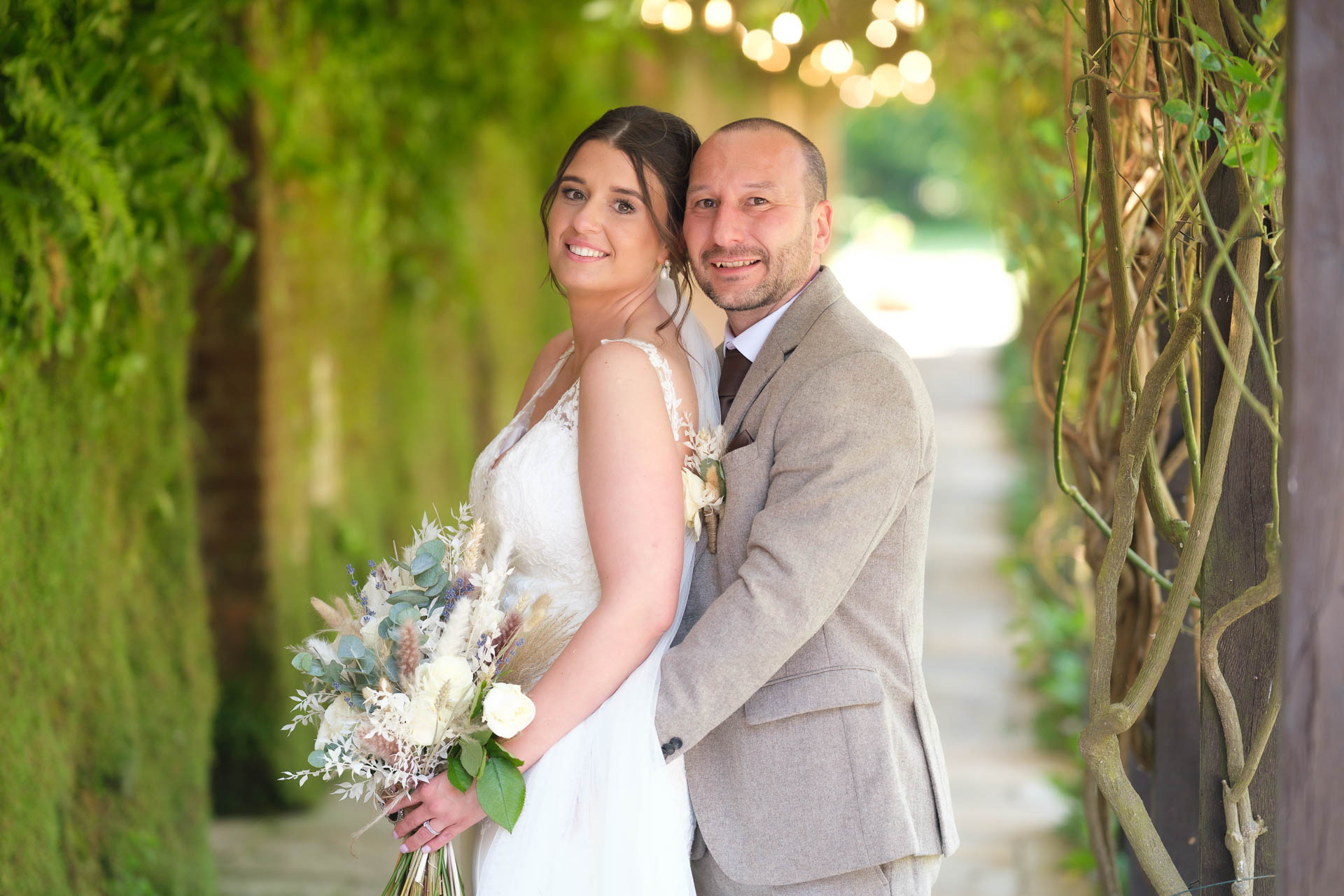 Couple kissing with a beautiful sunset at All Manor of Events Heffs Photography