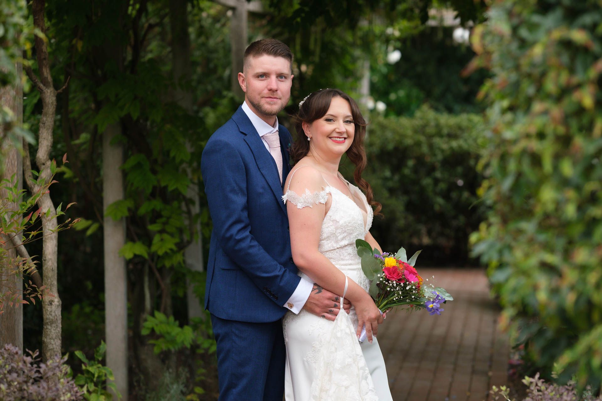 Couple kissing with a beautiful sunset at All Manor of Events Heffs Photography